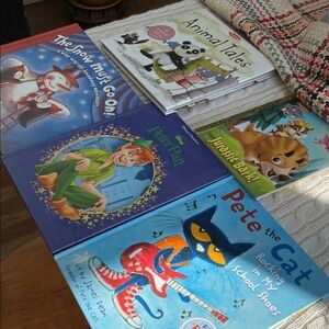 Children’s book lot of 5. Pete the Cat, Peter Pan, The Snow Must go On, Animal